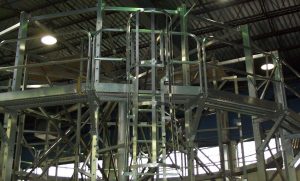 An access platform at approximately mid-height of an I.J. White Spiral Cooling or Freezing System